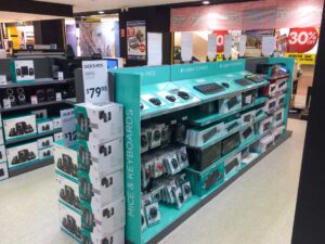 Custom designed permanent retail point of sale displays for products in retail by Genesis Retail Displays pop manufacturer in Sydney Logitech consumer electronics products on a shelf